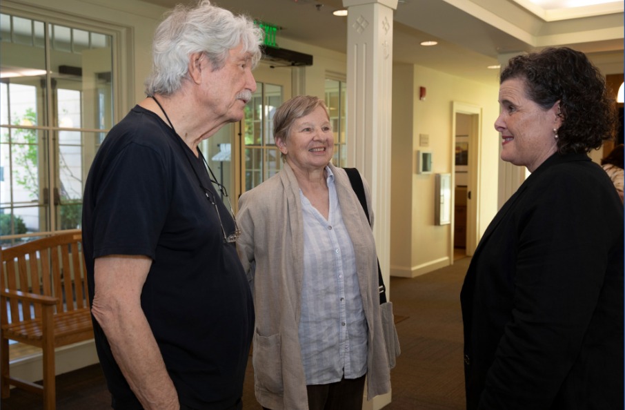 Kathy Caulfield speaking with Fairfield residents at a community event