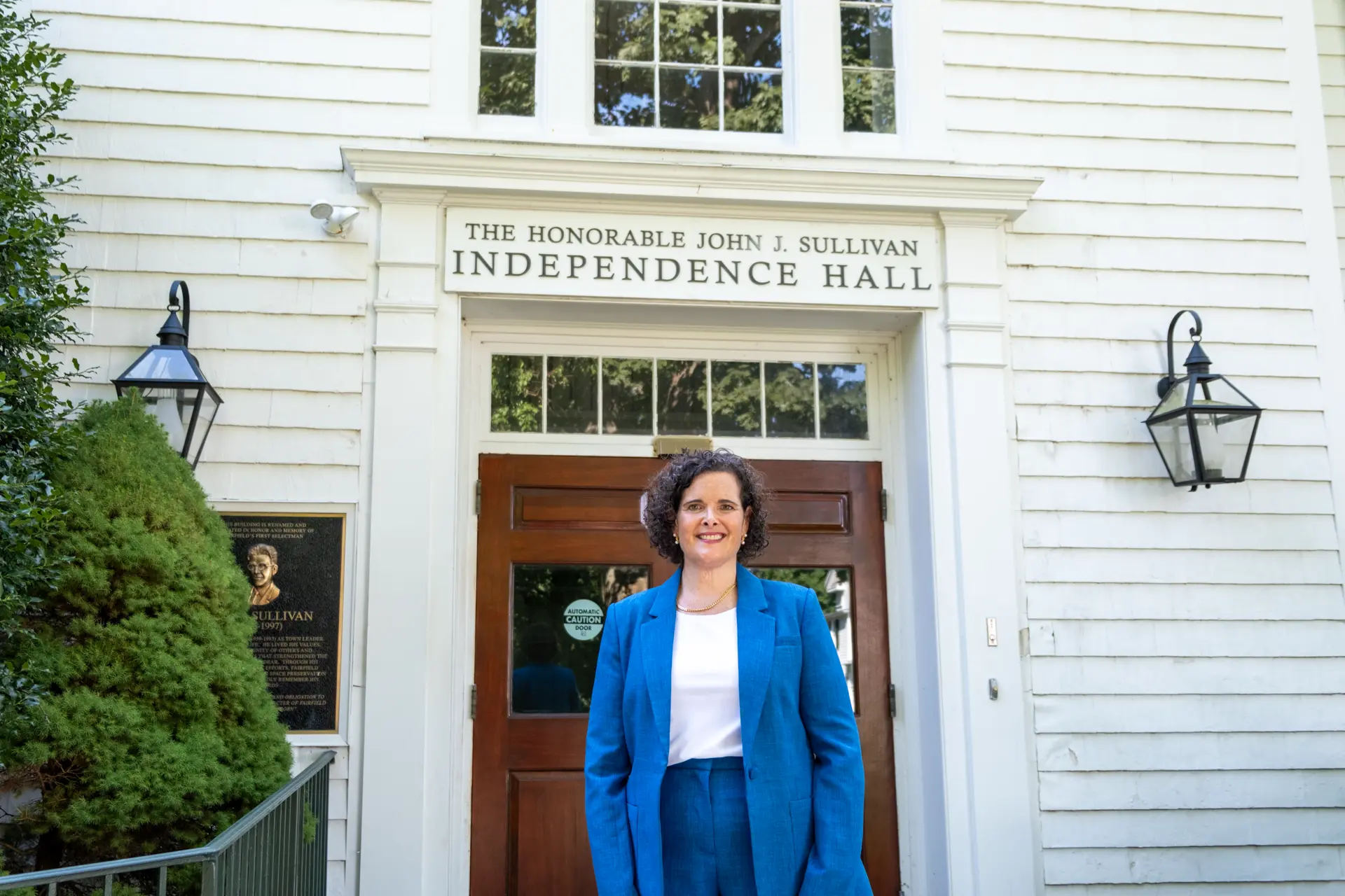 Kathy Caulfield outside the Honorable John J. Sullivan Independence Hall in Fairfield